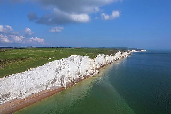 Aerial view of the Seven Sisters chalk white cliffs on a sunny day, South Downs National Park, East Sussex, England, United Kingdom, Europe