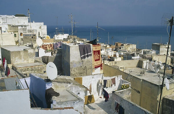 20056296. MOROCCO Tangier View over rooftops with satelite dishes visible