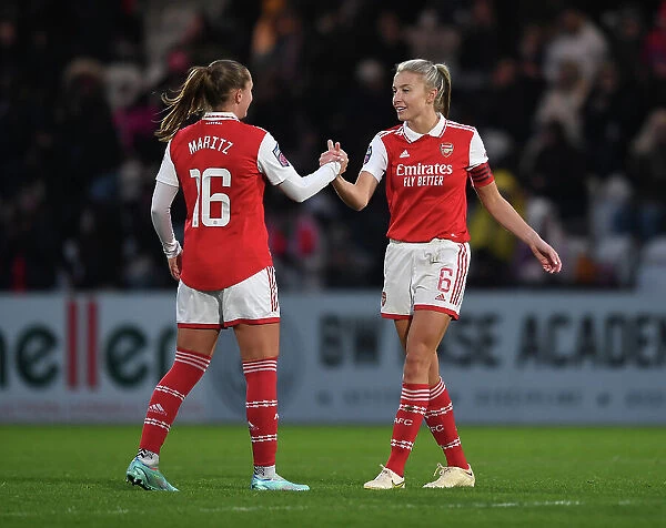 Arsenal Women Celebrate FA WSL Victory: Maritz and Williamson's Triumphant Embrace