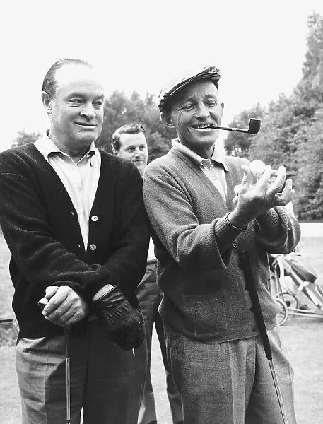 Teeing up for the moon on golf course Bing Crosby and Bob Hope