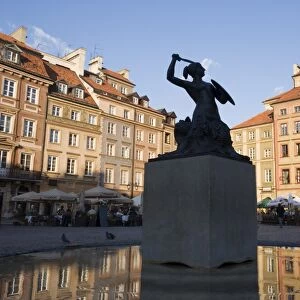 Warsaw Mermaid Fountain and reflections of the Old Town houses