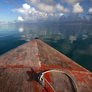 A boat floats in the lagoon near Bikeman islet, located off South Tarawa in the central