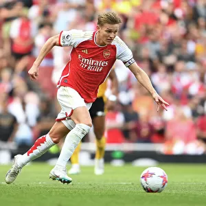 Arsenal's Martin Odegaard Charges Forward Against Wolverhampton Wanderers in 2022-23 Premier League Clash