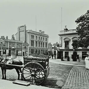 Upper Richmond Road, west from Putney High Street, showing horse drawn vehicle in