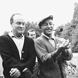 Teeing up for the moon on golf course Bing Crosby and Bob Hope