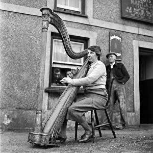 Welsh Harpist Marry Anne Jones seen here performing in the street. March 1952 C1118